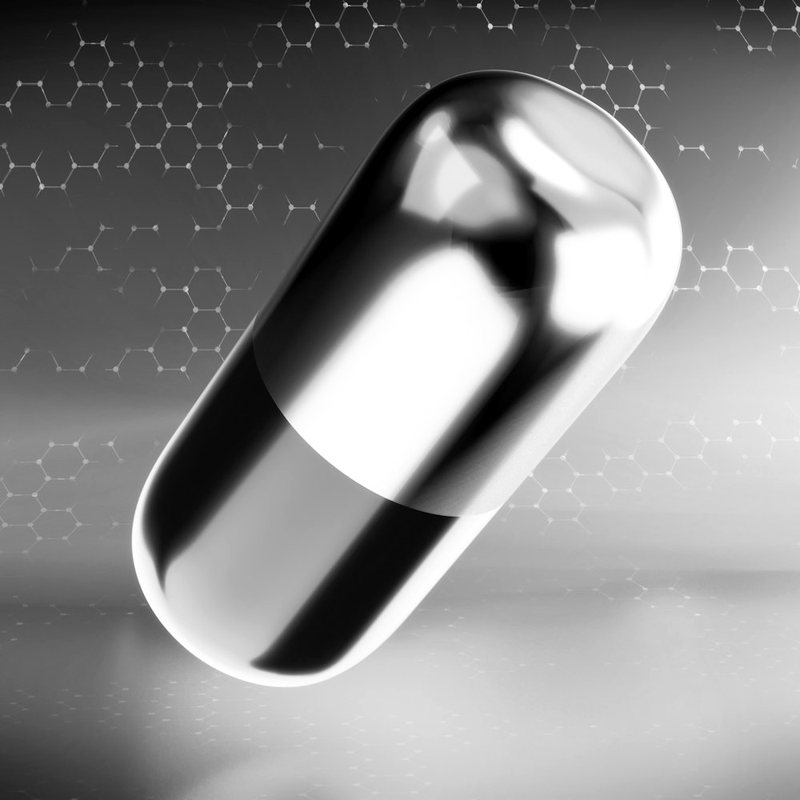 A capsule photographed in black and white